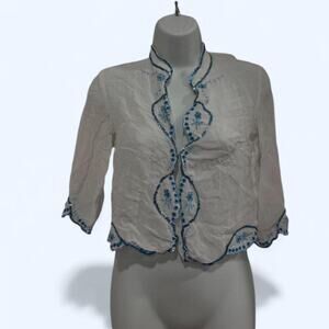 Blue and cream embroidered blouse